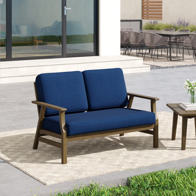 Causeuse d'extérieur en teck massif avec coussin et accoudoirs