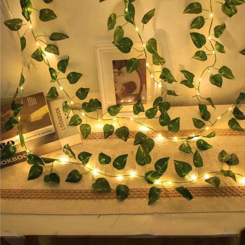 Les guirlandes de lumières vertes à guirlande de feuillage vert à DEL allument des guirlandes de lumières décoratives à énergie solaire pour la cour et la pièce