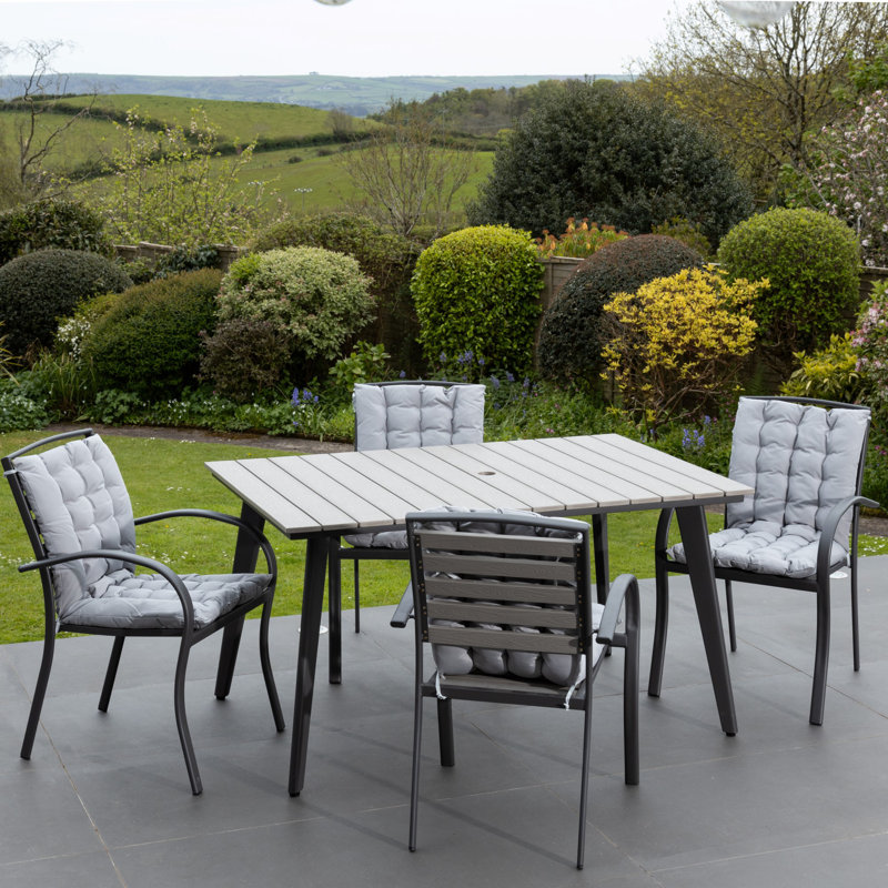 Maddin 4 - Person Patio Dining Set with Rectangular Table , Cushions Included