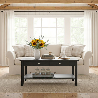 Table basse à 4 pieds en bois massif avec rangement Ambrianna
