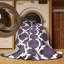 Tapis mauve lavable à la machine-987364527