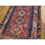 Tapis de couleur rustique antique à motif géométrique tribal
