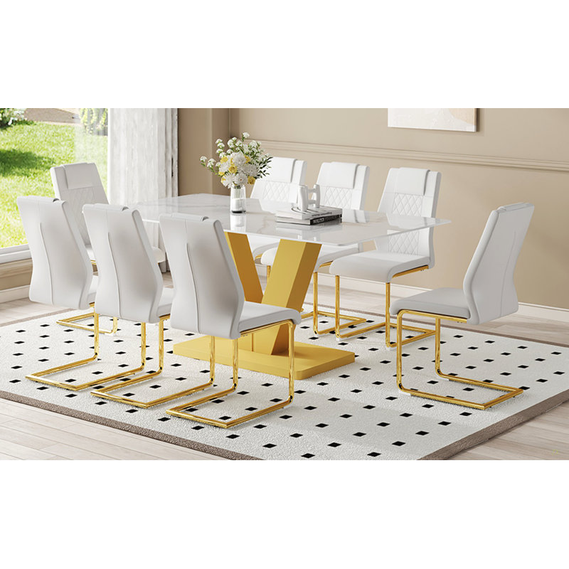 Ensemble de table et de chaises. Ensemble de table de salle à manger en verre trempé blanc neige moderne avec chaises en polyuréthane de luxe.