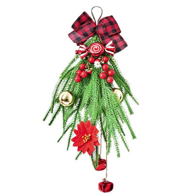 Décoration murale de Noël artificielle avec des bandes de pin, des ornements de bonbons et un arc, de la fausse verdure pour la porte d'entrée et la décoration des Fêtes