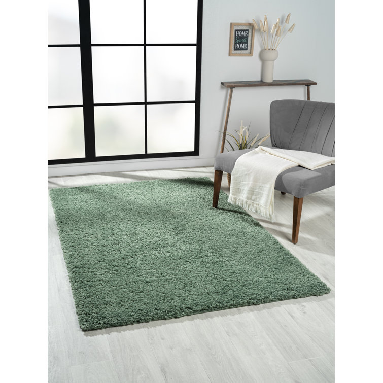 Lush shaggy carpet in  green