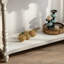 Console rustique sculptée avec pieds fuselés tournés
