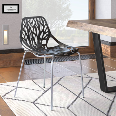 Chaise de salle à manger empilable Asbury avec dossier à découpes florales et pieds en acier inoxydable