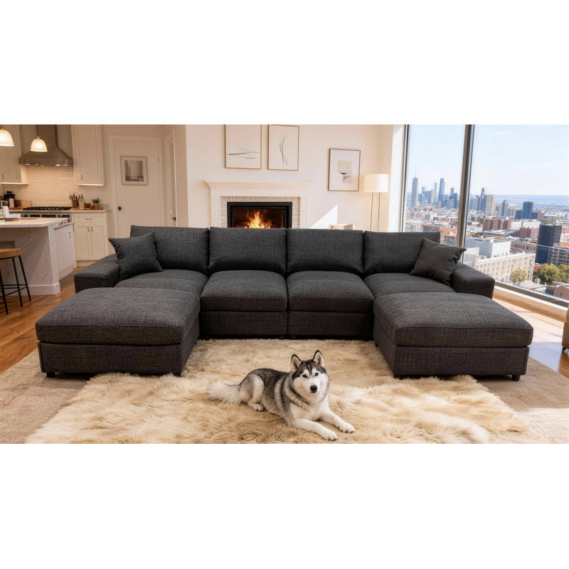 Anchoretta 134" Wide Reversible Modular Sectional with Ottoman, Black Gray Linen