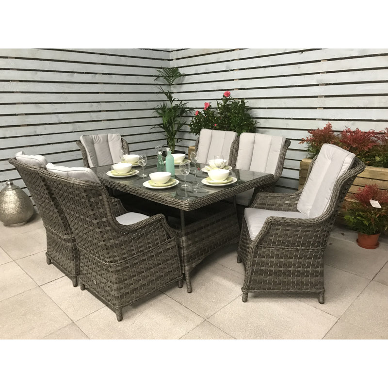 Cadmose 6 - Person Wicker Patio Dining Set with Rectangular Table , Cushions Included