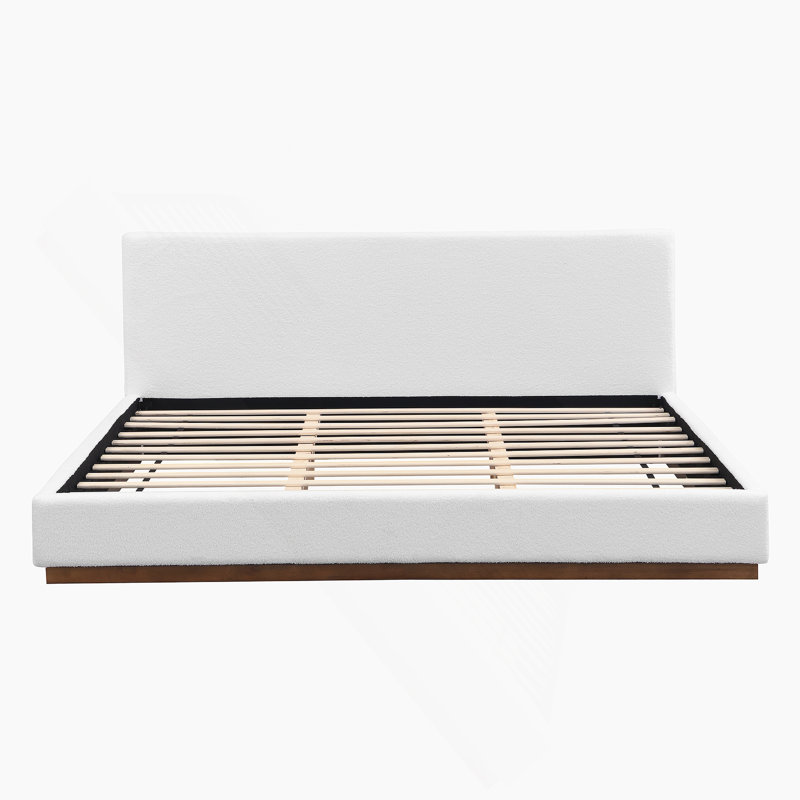 Élégant lit tapissier en tissu blanc avec base en bois massif, idéal pour le confort et la durabilité, très grand