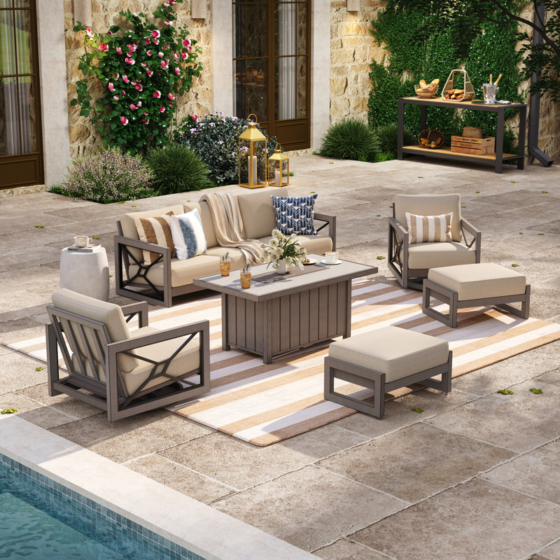 Ensemble de conversation pivotant en aluminium Marindo avec coussins Sunbrella® et table foyer en béton