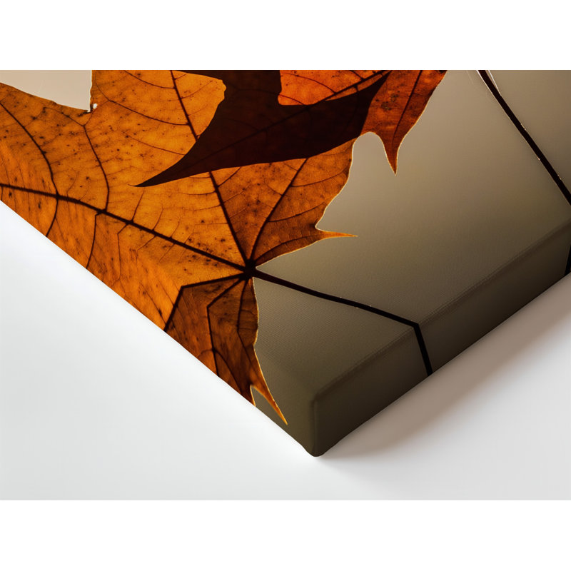 Toile, un gros plan de deux feuilles d'érable éclatantes révèle leur art mural, riche teinte orange brûlé et ambre foncé avec veines complexes