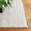Tapis noir en laine tissé à la main-27505219
