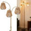 Lampe sur pied en rotin doré