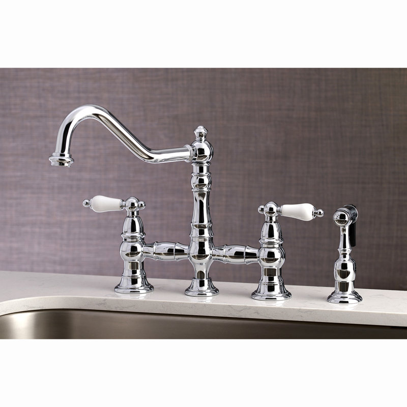Kingston Brass Restoration Two-Handle 4-Hole Deck Mount Bridge Kitchen Faucet with Brass Side Sprayer, Polished Chrome