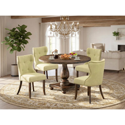 L'ensemble de mobilier de salle à manger 5 pièces comprend une table de salle à manger ronde avec piédestal et 4 chaises rembourrées en tissu Linelight, patiné Jacobean