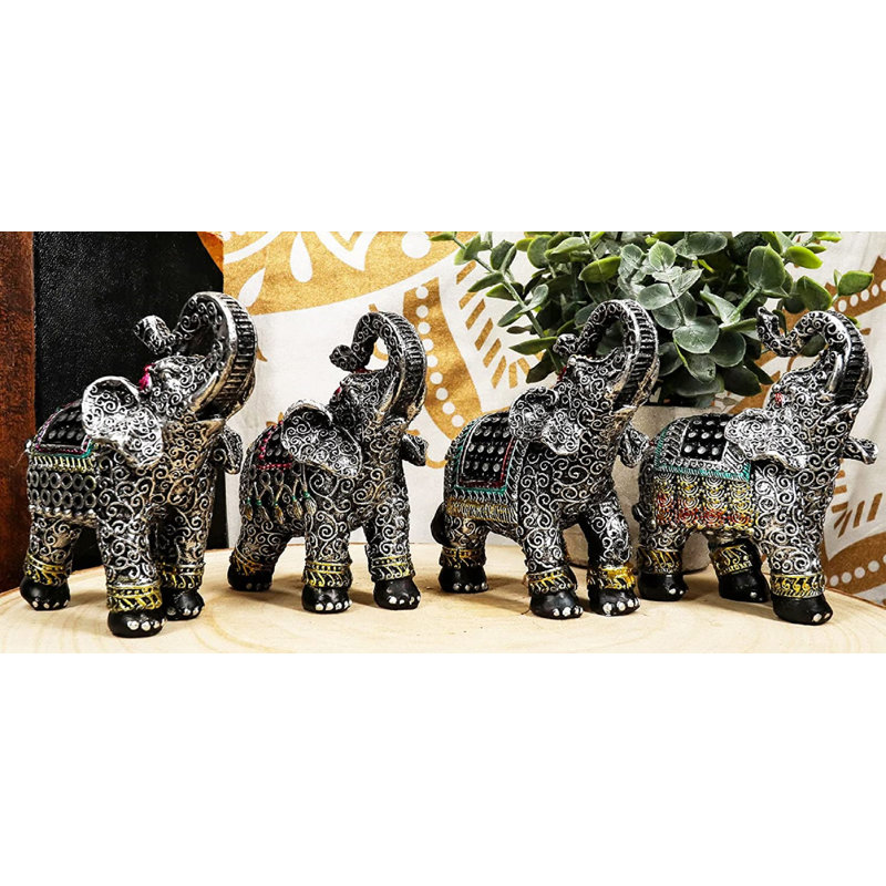 Ensemble de 4 figurines d'éléphant décorées