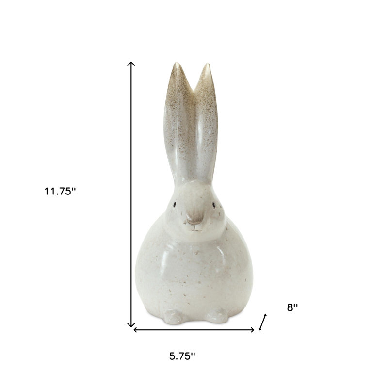 Ensemble de deux figurines de lapin blanc et brun en terre cuite