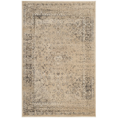 Tapis beige à motif abstrait Evanoff