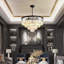 Lustre moderne en cristal noir avec conception à 4 niveaux, éclairage à intensité variable et chaîne réglable pour la salle à manger, le salon, la chambre à coucher et le vestibule