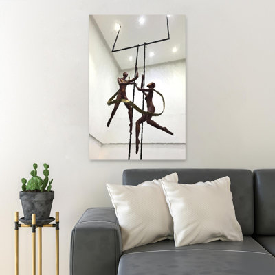 " Dancing Humans Hanging Decor Inside Room With Lights "