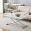 Table élévatrice avec plateau en MDF épais et pieds en métal argenté