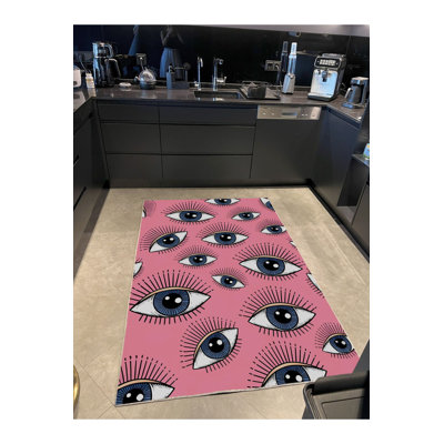 Tapis rose lavable à la machine