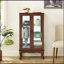 Vitrine lumineuse avec tablettes réglables et panneau arrière en miroir pour exposer des objets de collection