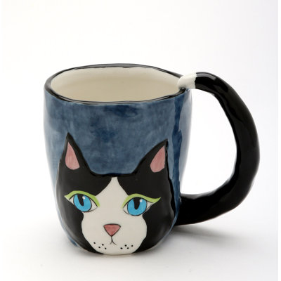 Tasse de chat chats dans le placard