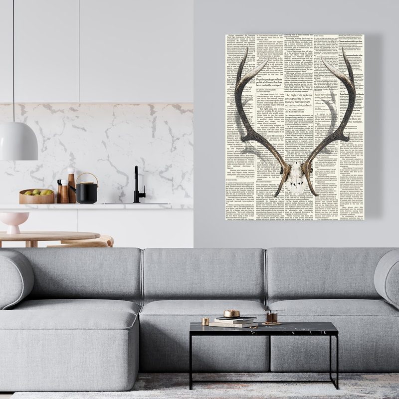 Cornes de cerf avec journal - décor de toile de salon rustique