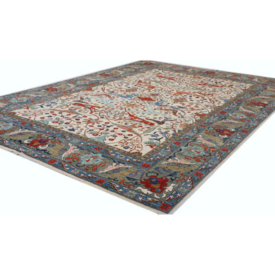 Tapis ivoire et multicolore de haute qualité noué à la main