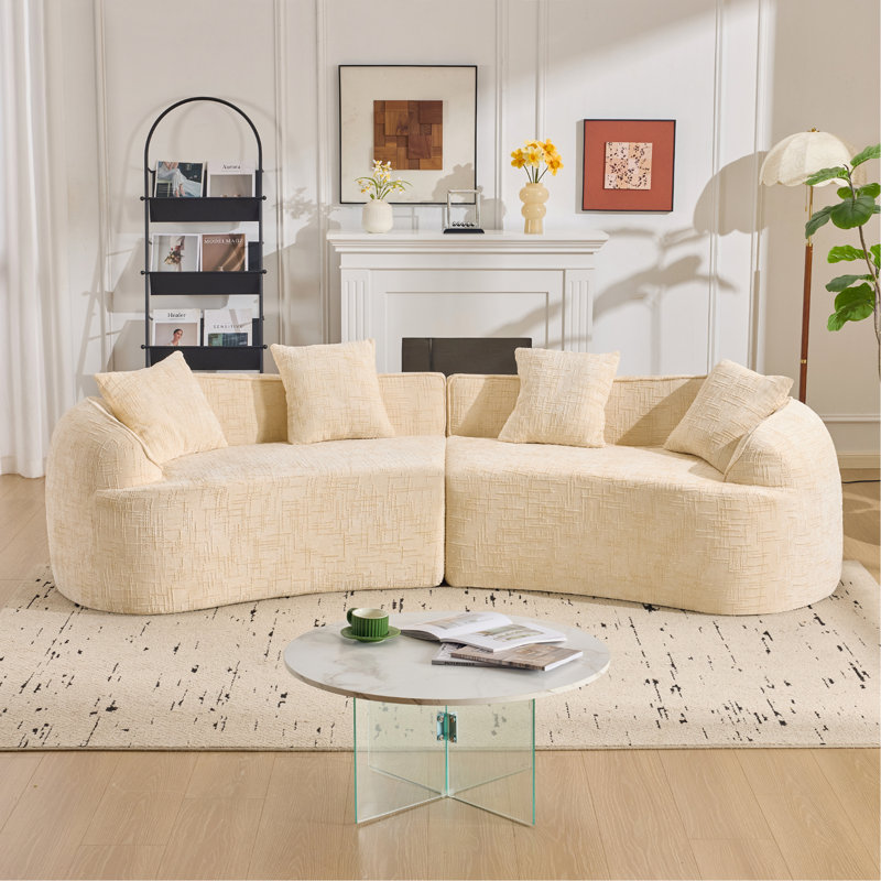 Canapé beige courbé et compressé, conception créative de style nordique pour le salon, confortable, doux et adapté à de multiples cas de figure