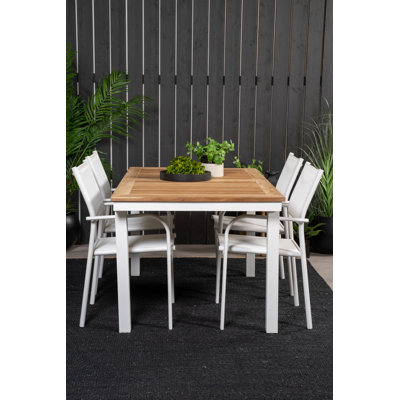 Navya 4 - Person Teak Extendable Rectangular Solid Wood Patio Dining Set