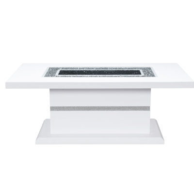 Table basse blanche. Style moderne avec détails scintillants. Fabrication robuste, lustré brillant et verre transparent. Bois d'hévéa, P 51,26 po x l 28,6 po H 20,18 po, plateau de table 114,29 lb et plateau brillant