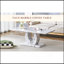 Table basse rectangulaire moderne en MDF à motif de marbre gris minimaliste pour une maison tranquille et confortable