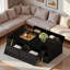 Table basse moderne moderne avec 4 tiroirs, base dorée et surface noire ultrabrillante