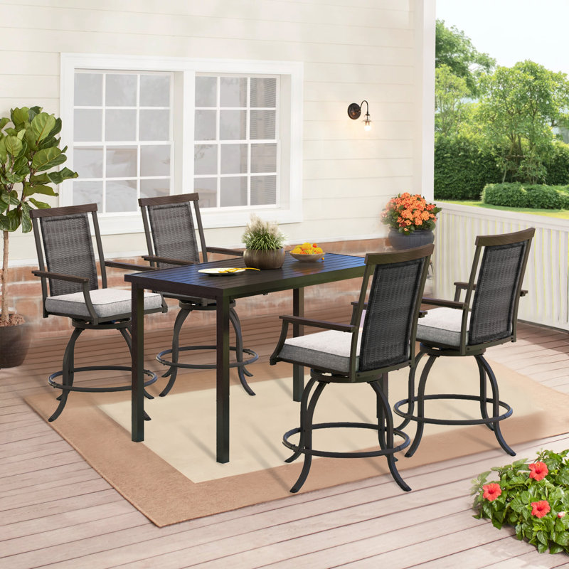 Alyne 4 - Person Patio Dining Set with Rectangular Table , Cushions Included