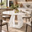 Table de salle à manger ronde de 119 cm (47 po) en bois fabriqué avec pied sculptural-598498936