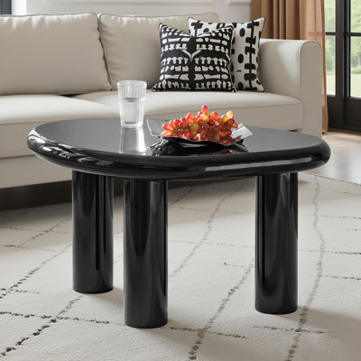 Considine Modern 36.25"W Lacquered Finish Simple Assembly Coffee Table with Adjustable Foot Pads by Latitude Run