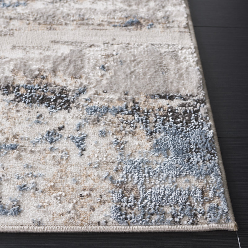 Ivory and Blue Abstract Stain-Resistant Rectangular Rug