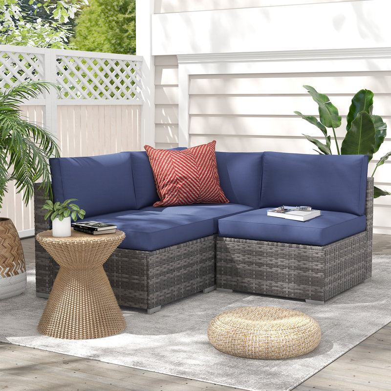 Ensemble de conversation modulaire avec coussins 4 pièces Bryonny, Structure grise / coussin bleu marine