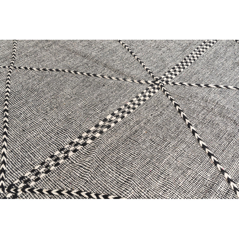 Tapis noir et blanc Orpheus