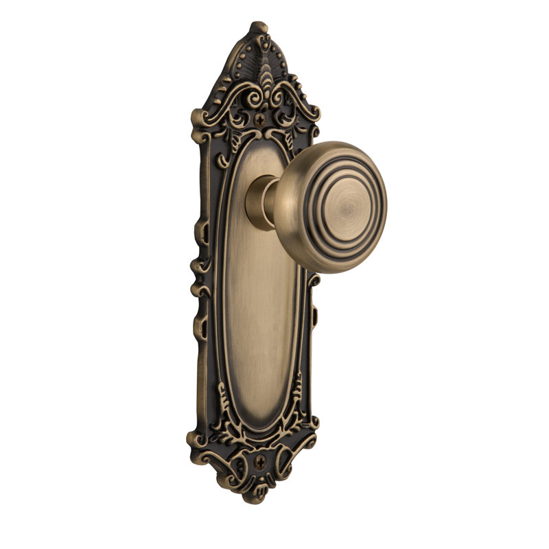 Deco Interior Mortise Door Knob with Victorian Long Plate, Antique Brass, 2 1/4