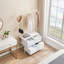 Portant à vêtements autoportant avec 4 tiroirs