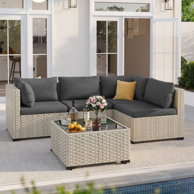 Ensemble de conversation de patio 5 pièces avec table basse et coussins