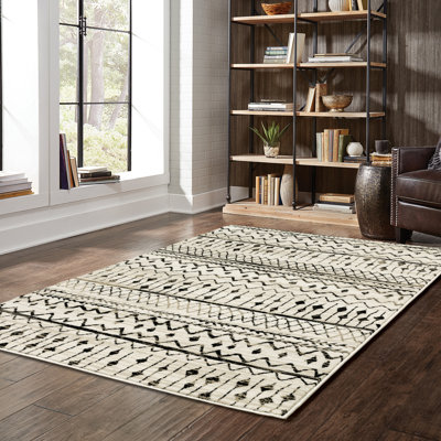 Tapis géométrique ivoire en polypropylène tissé à la machine Basurto