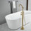 Robinet de baignoire romaine fixé au sol avec douche à main et poignée simple