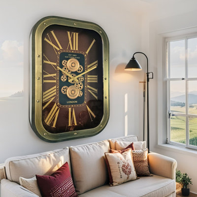 Horloge murale avec engrenages en mouvement de The The Gear