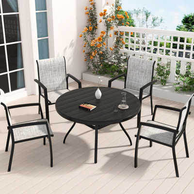 Ensemble de salle à manger de patio, ensemble de mobilier de patio de 4 chaises de patio empilables et table ronde d'extérieur en métal de 40,6 po