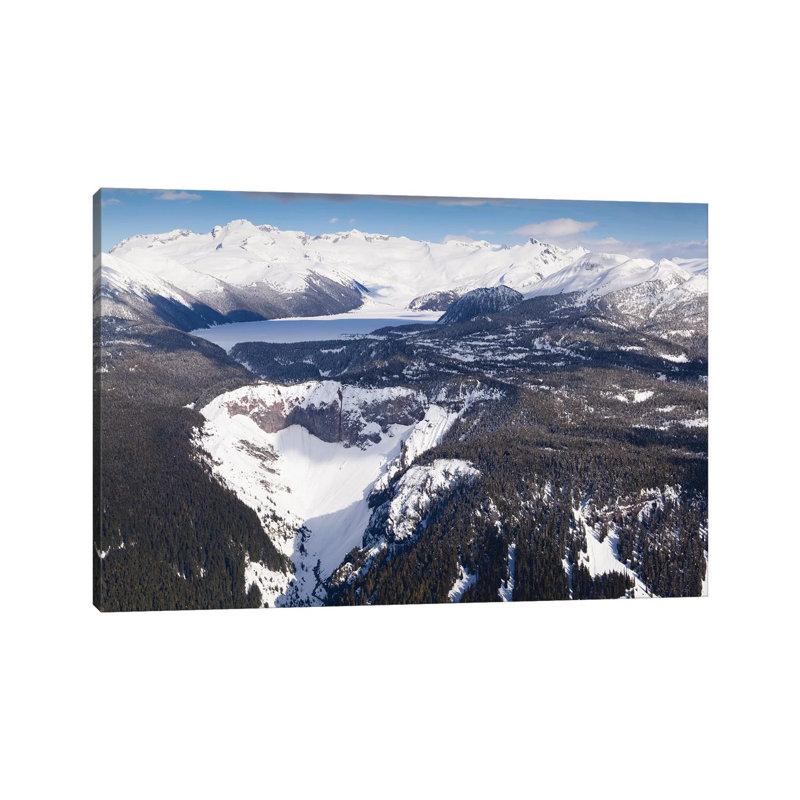 Aerial View Of Frozen Garibaldi Lake And Lava Barrier In The Foreground. by Kristin Piljay - Wrapped Canvas Print